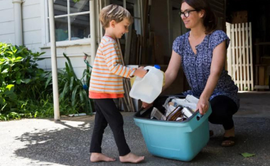 woman & child recycling